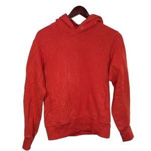 Stay Cozy in Style: Uniqlo Extra Small Orange Hoodie with Side Pockets